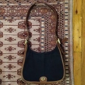 Coach shoulder bag with flap closure